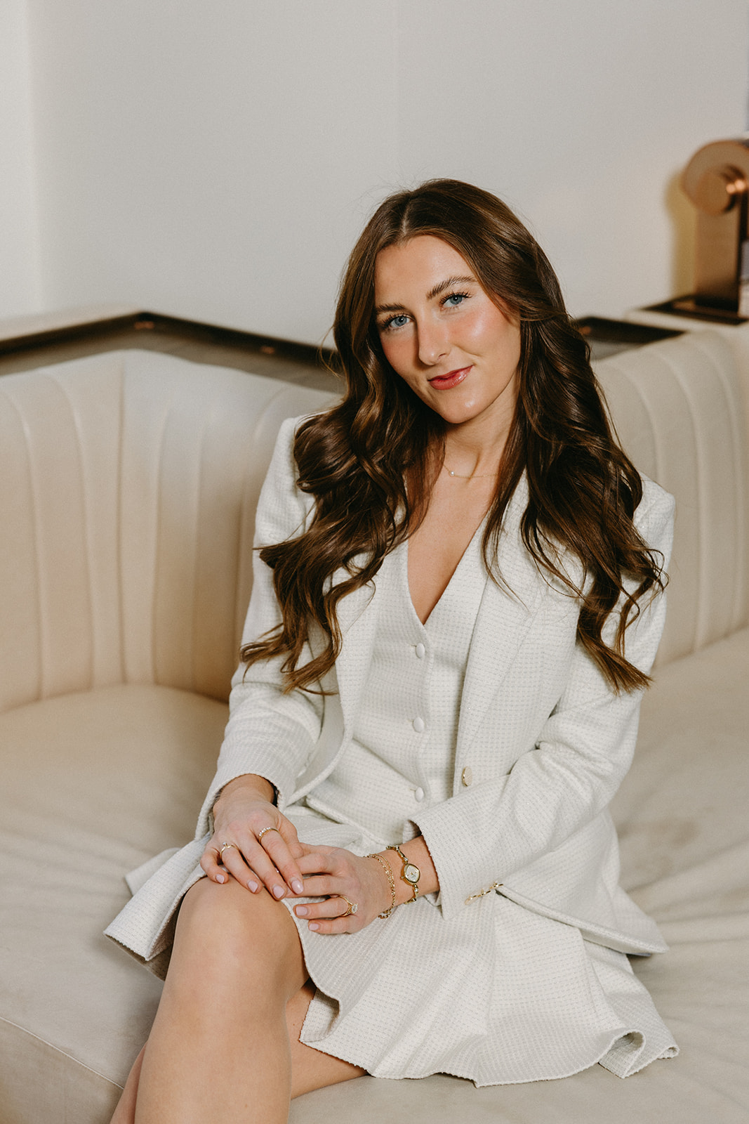 Woman in a custom cream blazer